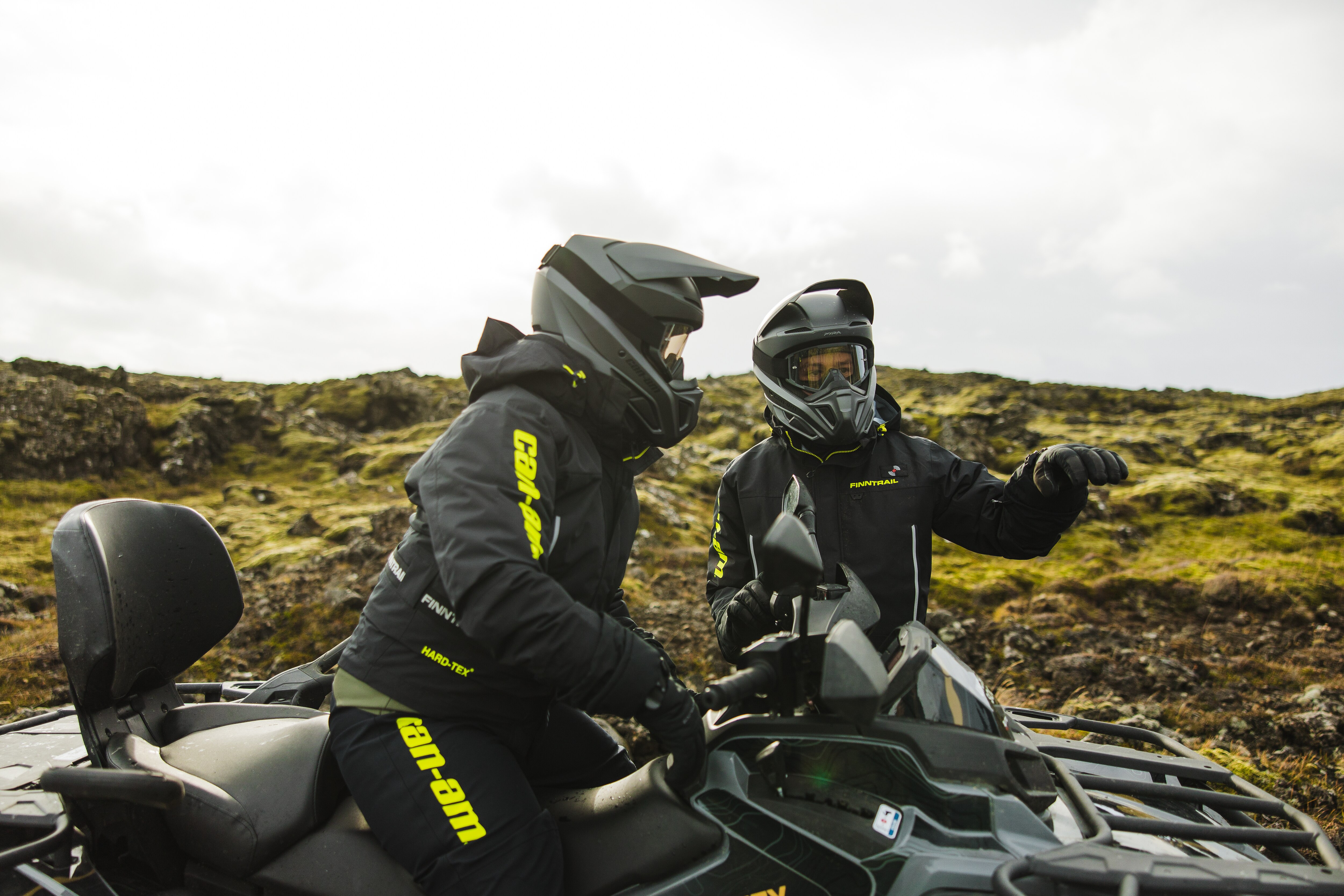 Two people chatting on Can-Ams